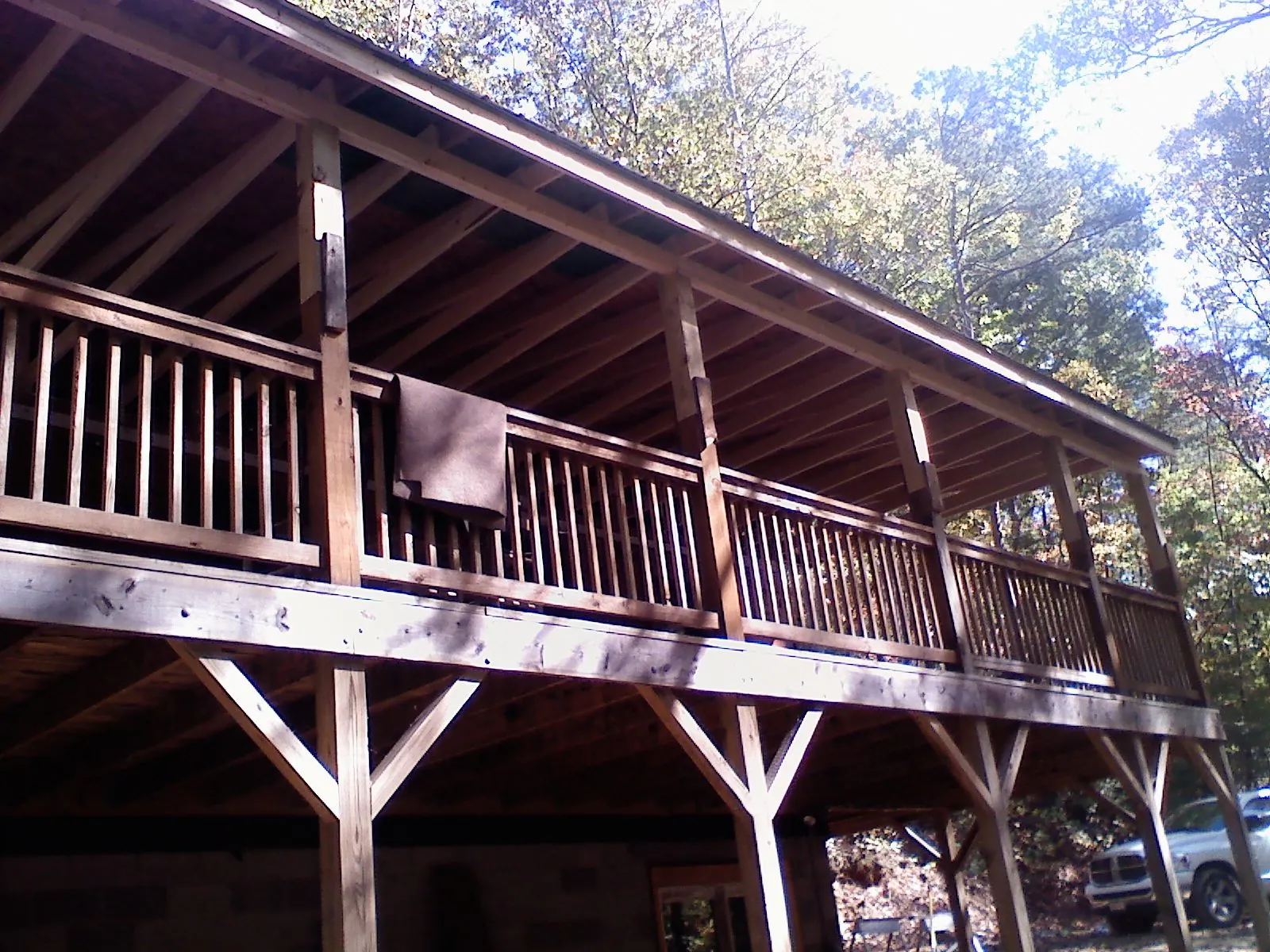 Timber framing under a new elevated porch and deck — Roof Leak Repair in Arthur by Roofing Brothers